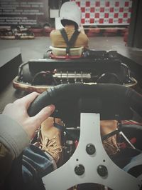 Cropped image of woman holding smart phone