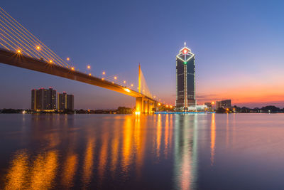 Illuminated buildings at waterfront