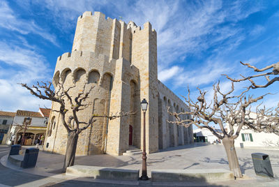 Low angle view of historical building against sky