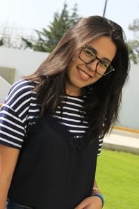 Portrait of smiling young woman