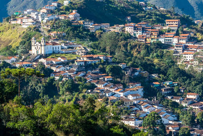 High angle view of townscape and trees in town