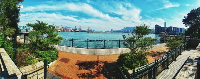 High angle view of river amidst trees against sky