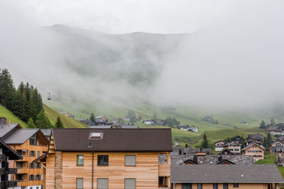 Houses in foggy weather