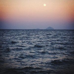 Scenic view of sea at sunset