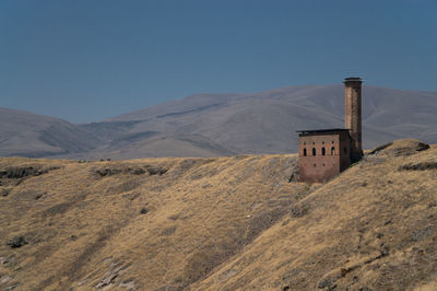 Scenic view of mountains against clear sky