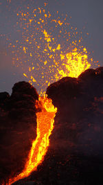 High angle view of bonfire against sky at night