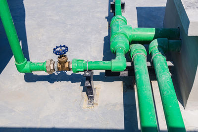 High angle view of pipes on metal pipe