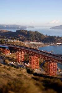 High angle view of bridge by sea against sky