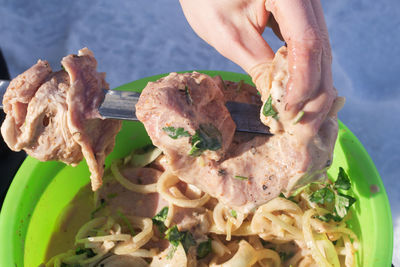 Close-up of person preparing food