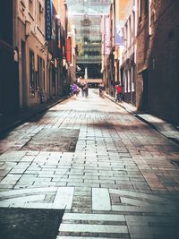 Narrow alley along buildings