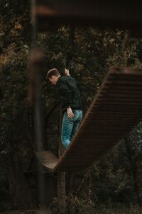 Shadow of people on tree in forest