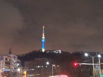 Low angle view of illuminated city at night