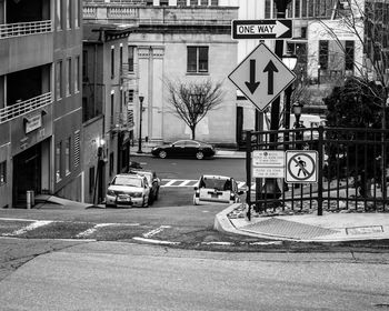 Cars on road in city