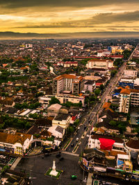 High angle view of street amidst buildings in city