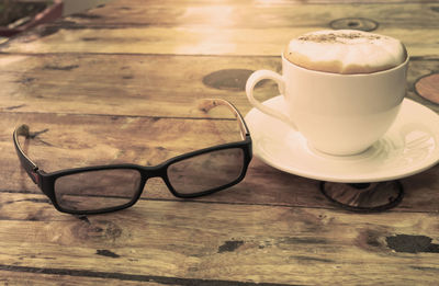 Close-up of coffee cup on table