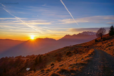 Scenic view of mountains against sky during sunset