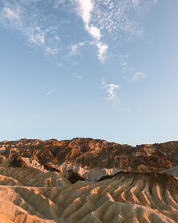 Scenic view of rock formations against sky