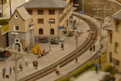 Tilt-shift image of people in city