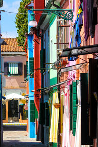 Low angle view of clothes drying outside building