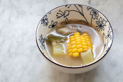 High angle view of eggs in bowl on table