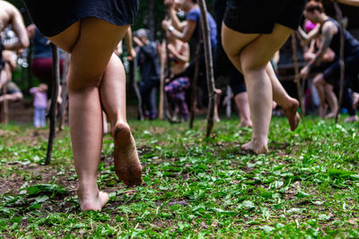 Low section of people on grassland