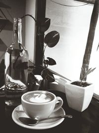 Close-up of coffee cup on table