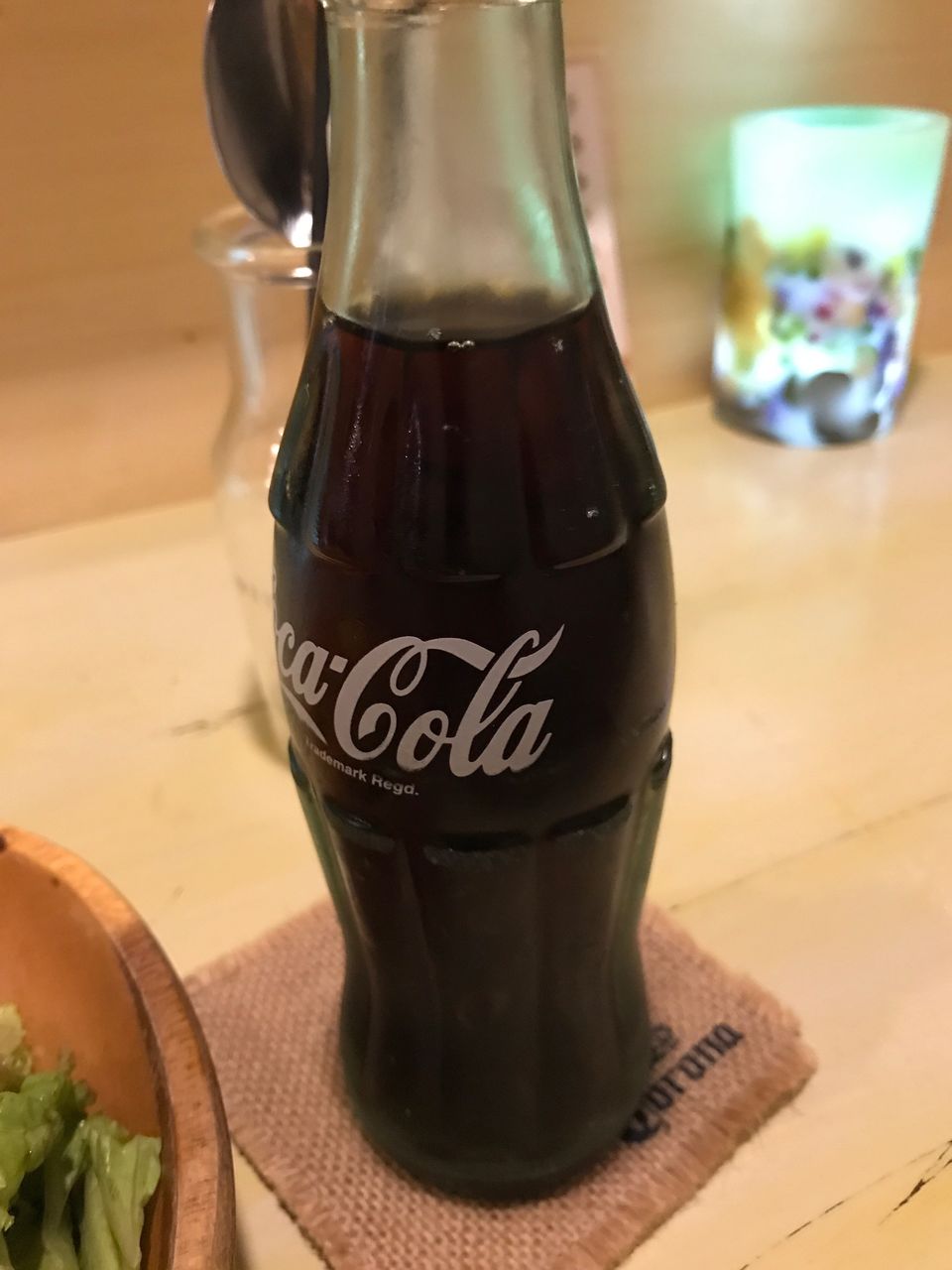 bottle, food and drink, text, drink, indoors, still life, table, no people, close-up, container, refreshment, focus on foreground, freshness, food, frothy drink, alcohol, day