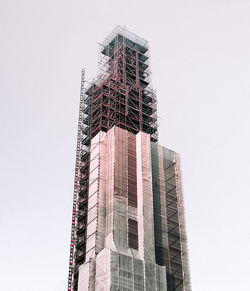 Low angle view of under construction building against clear sky