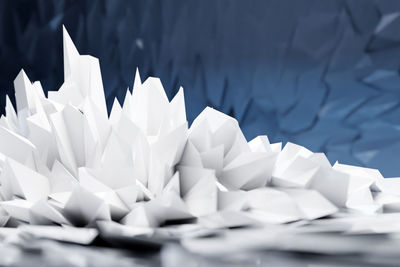 Close-up of paper flowers on table