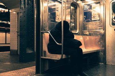 Man sitting in train