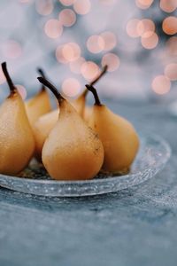 Close-up of pears in plate on table