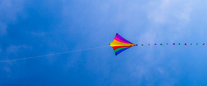 Low angle view of kite in sky