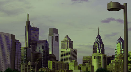 Panoramic view of buildings against sky in city