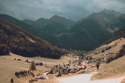 High angle view of town against cloudy sky