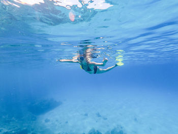 Man swimming in sea