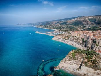 High angle view of bay against sky