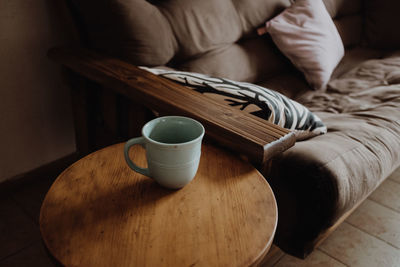 Coffee cup on table at home