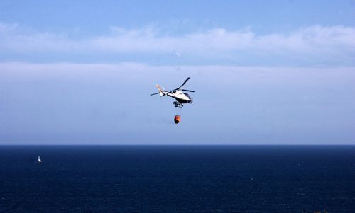 Airplane flying over sea