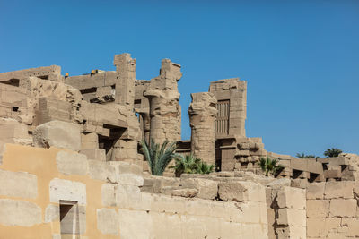 Different hieroglyphs on the walls and columns in the karnak temple.