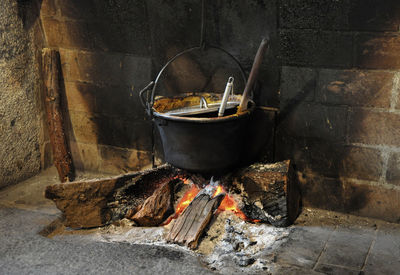 Cooking container on wood burning stove