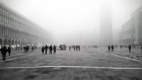 Group of people in foggy weather