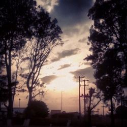 Scenic view of cloudy sky at sunset