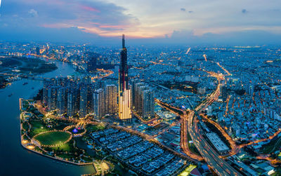 High angle view of illuminated buildings in city