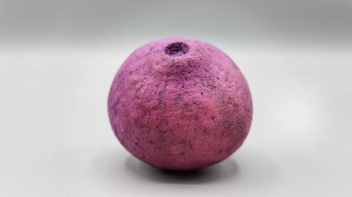 Close-up of apple against white background