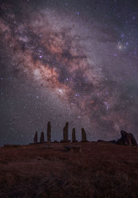 Scenic view of star field against sky at night