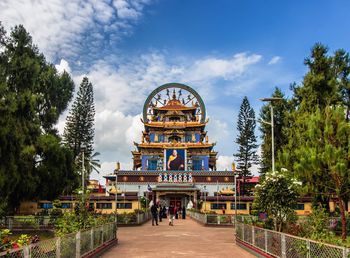 View of temple against cloudy sky