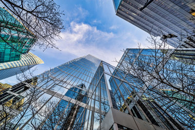 Low angle view of modern buildings against sky