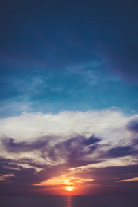 Scenic view of dramatic sky during sunset