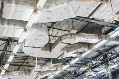 Low angle view of air ducts in factory