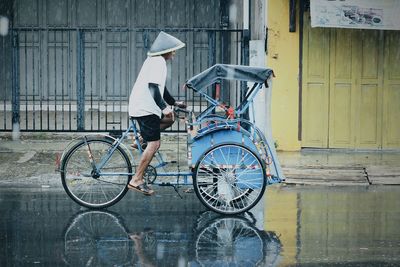 Side view of a bicycle against the road